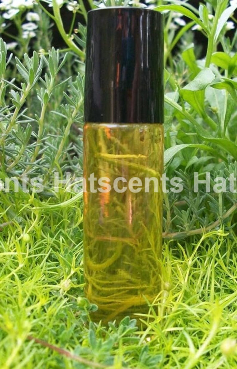 Dragon's Blood Fragrance Oil 1/3 Ounce Roll On and one oil sample