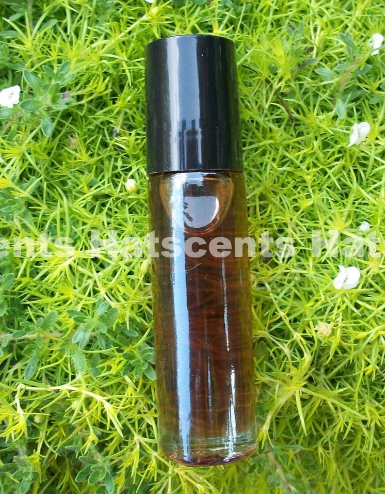 Black Oud Oil Fragrance Perfume 1/3 Ounce Roll on and one oil sample of your choice